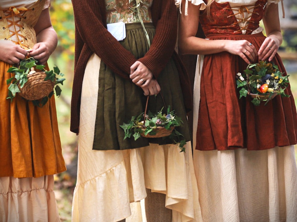 Bridal party holding fantasy-themed crochet handbaskets